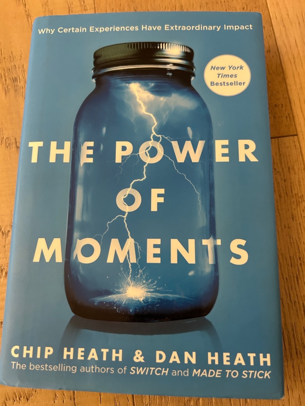 The Power of Moments by Chip Heath & Dan Heath - Blue Hardcover